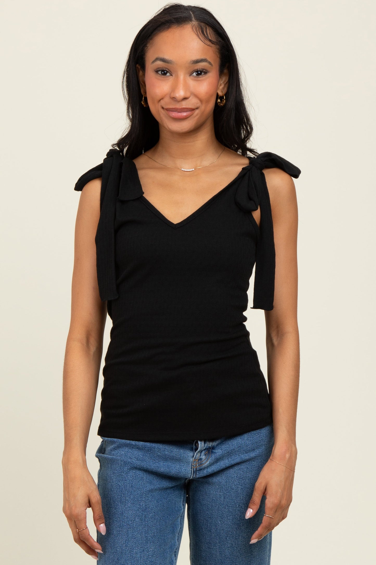 Black Solid Ribbed Sleeveless Tie V-Neck Top